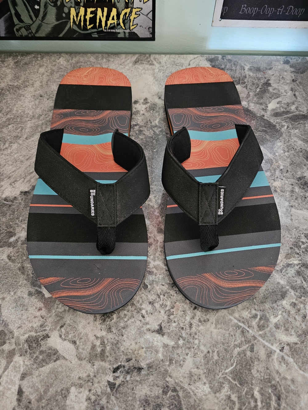 3/$25 No Boundaries Men’s Black Flip-Flops with Orange and Teal Stripes